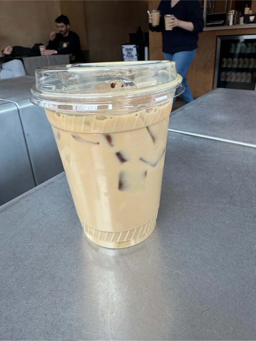 iced vanilla latte at Little Flower Cafe