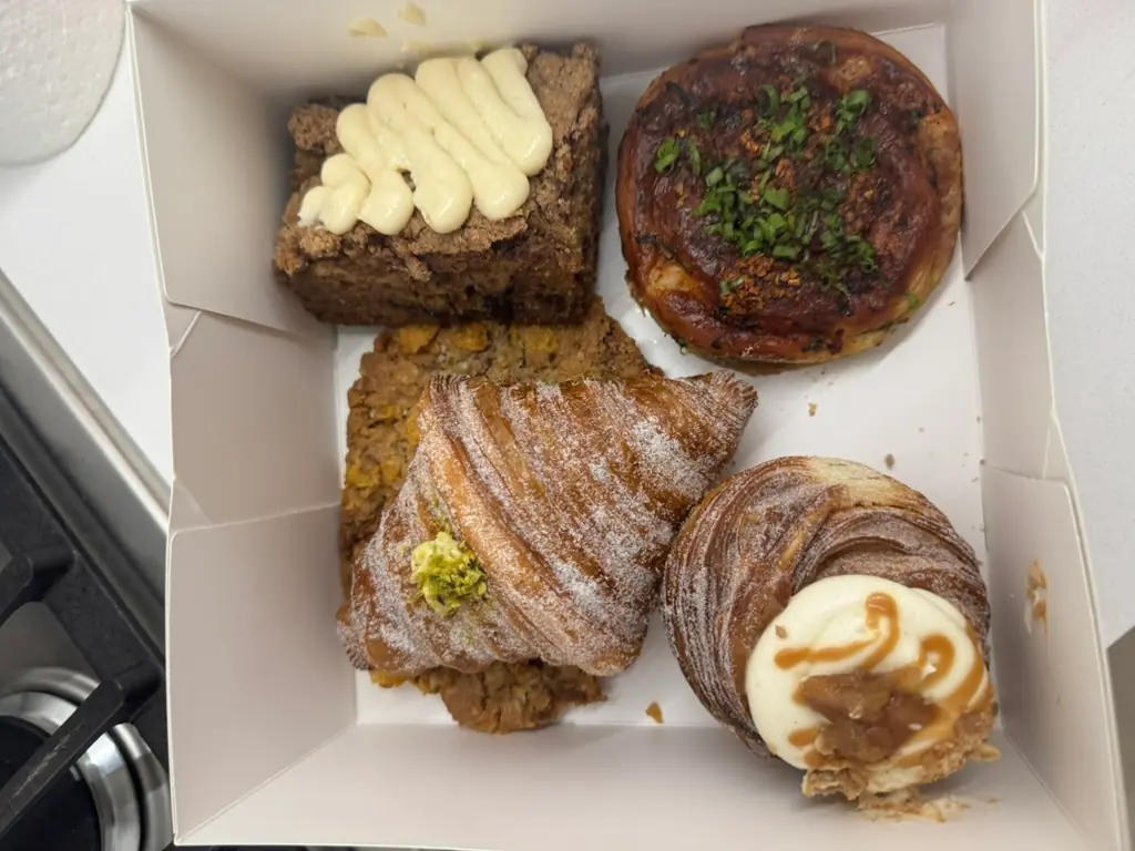 Banana coffee cake, rice roll bun, pistachio cardamom croissant and apple vanilla bean cruffin at Butter & Crumble