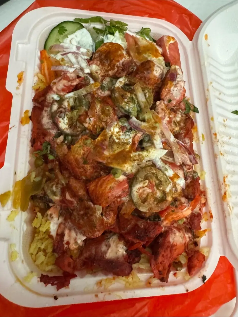chicken tandoori over rice at Indian Biriyani House
