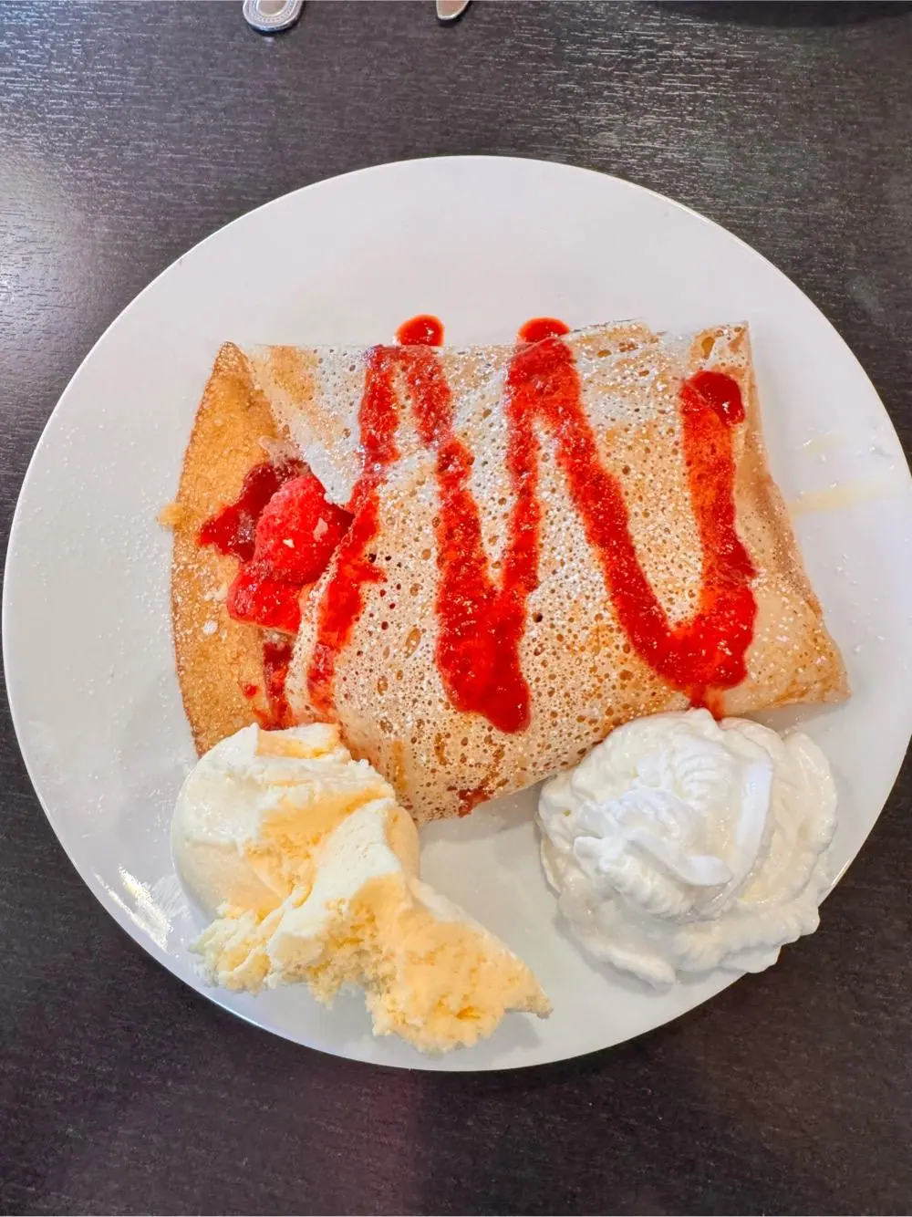 Strawberry cheesecake crepe at Frodo Joe's Petit Cafe