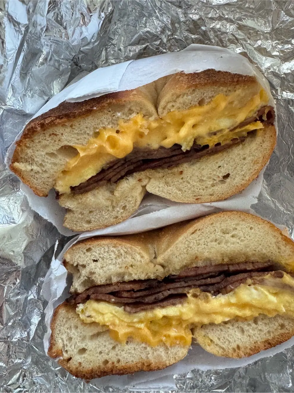 Plain bagel with egg cheese and turkey bacon at Rollin Bagels (Food Truck)